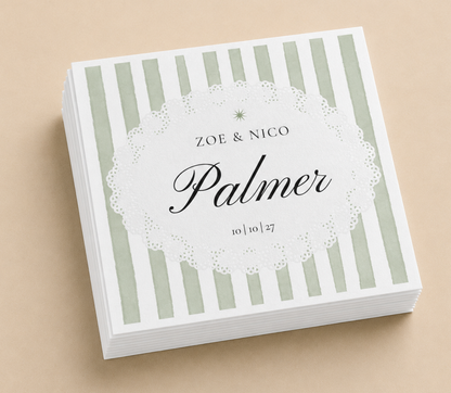 Personalized green striped wedding napkins with custom names, wedding date, and black script typography on white paper napkins
