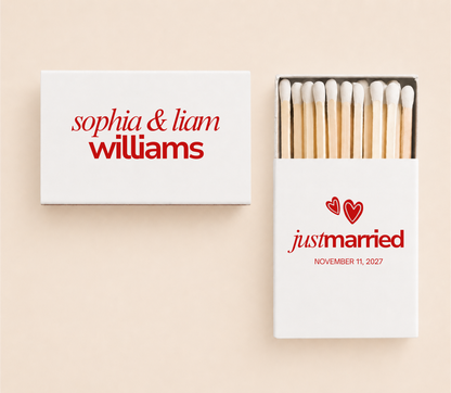 Personalized Just Married wedding matchboxes with custom names, wedding date, and red heart artwork on white matchboxes