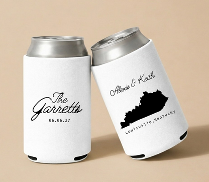 White personalized wedding can coolers featuring a Kentucky state silhouette, couple's names, Louisville wedding location, and custom wedding date.