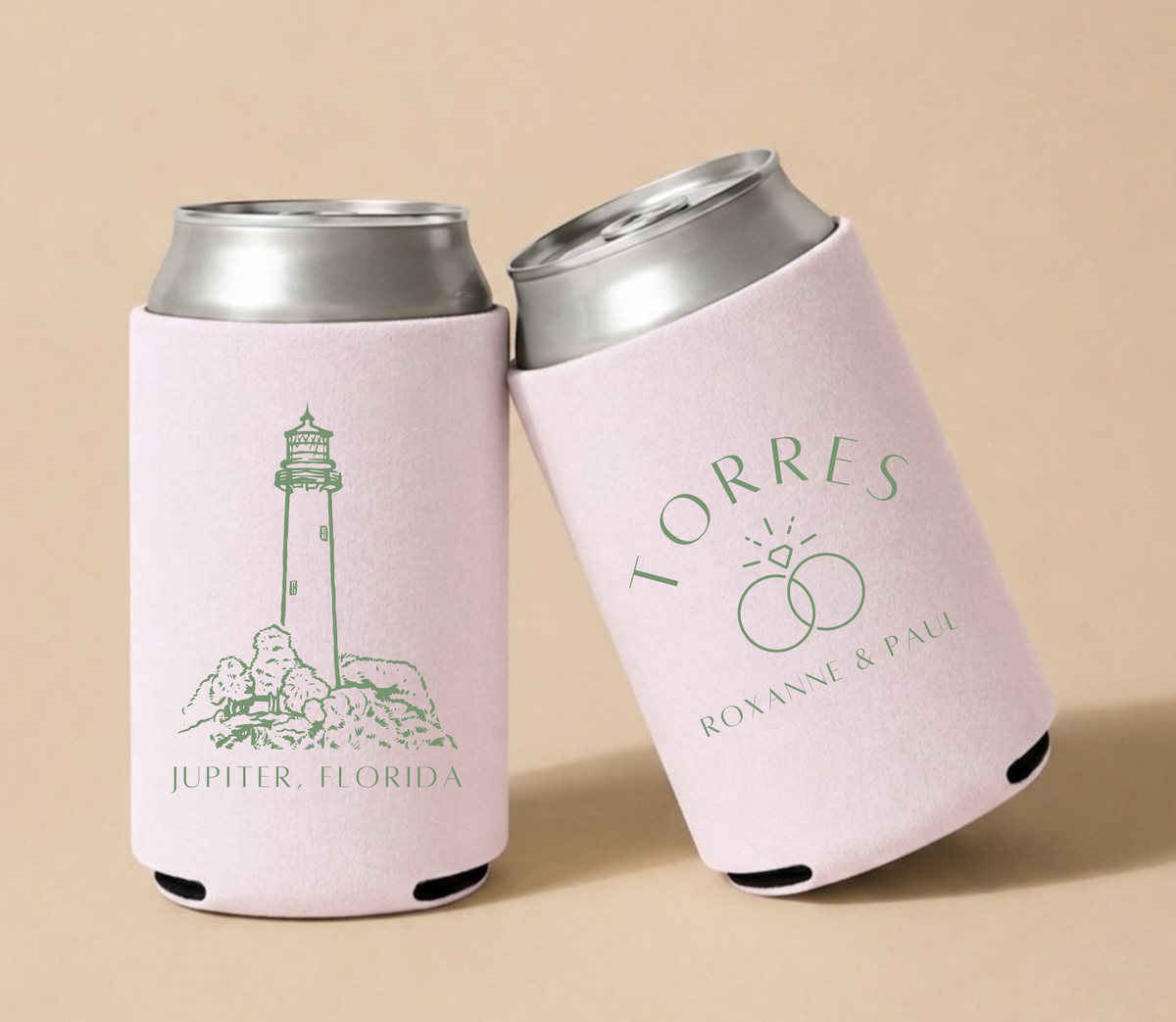 Light pink personalized wedding can coolers featuring a lighthouse illustration, Jupiter Florida coastal design, custom names Roxanne and Paul Torres, and wedding-themed artwork.
