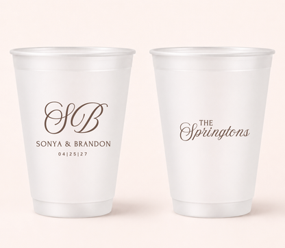 Personalized frosted wedding cups with elegant brown script design for signature cocktails and wedding favors