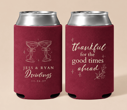 Personalized burgundy Thanksgiving wedding can coolers featuring champagne glasses, custom couple names, wedding date, and thankful wedding wording.