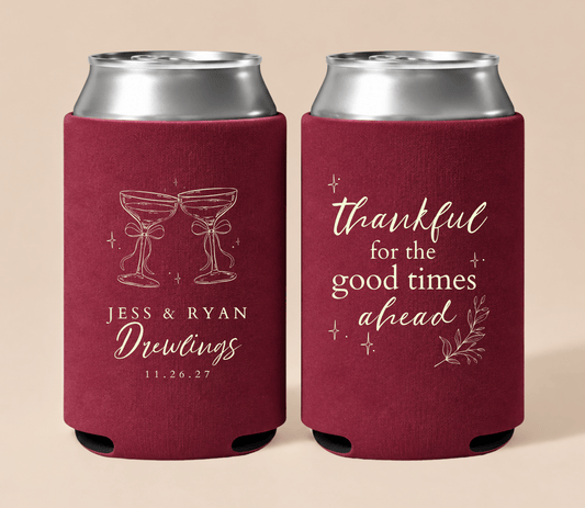 Personalized burgundy Thanksgiving wedding can coolers featuring champagne glasses, custom couple names, wedding date, and thankful wedding wording.
