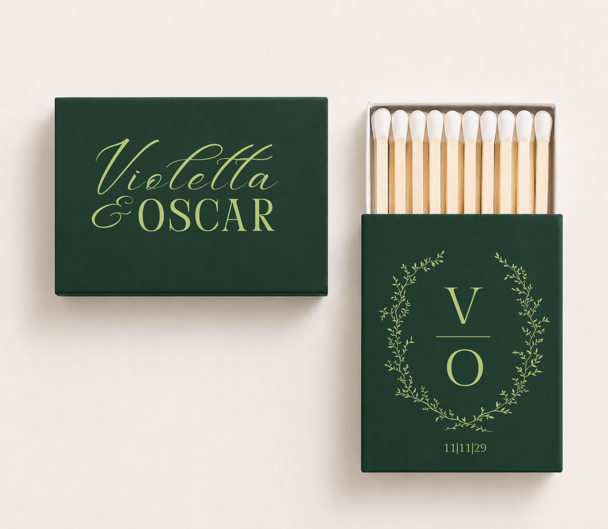Dark green personalized wedding matchboxes featuring custom couple names Violetta and Oscar, botanical monogram wreath, initials V and O, and wedding date.

Dark green wedding matchbox featuring personalized botanical monogram and custom initials.

Custom green wedding matchbox with elegant couple names and botanical wreath design.