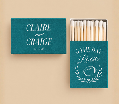 Personalized Game Day Love football wedding matchboxes featuring football and laurel artwork, custom couple names, and wedding date.
