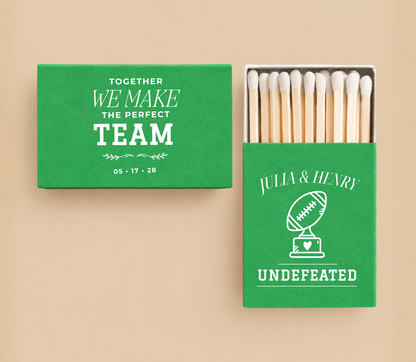 Personalized Together We Make The Perfect Team football wedding matchboxes featuring football trophy artwork, custom couple names, and wedding date.
