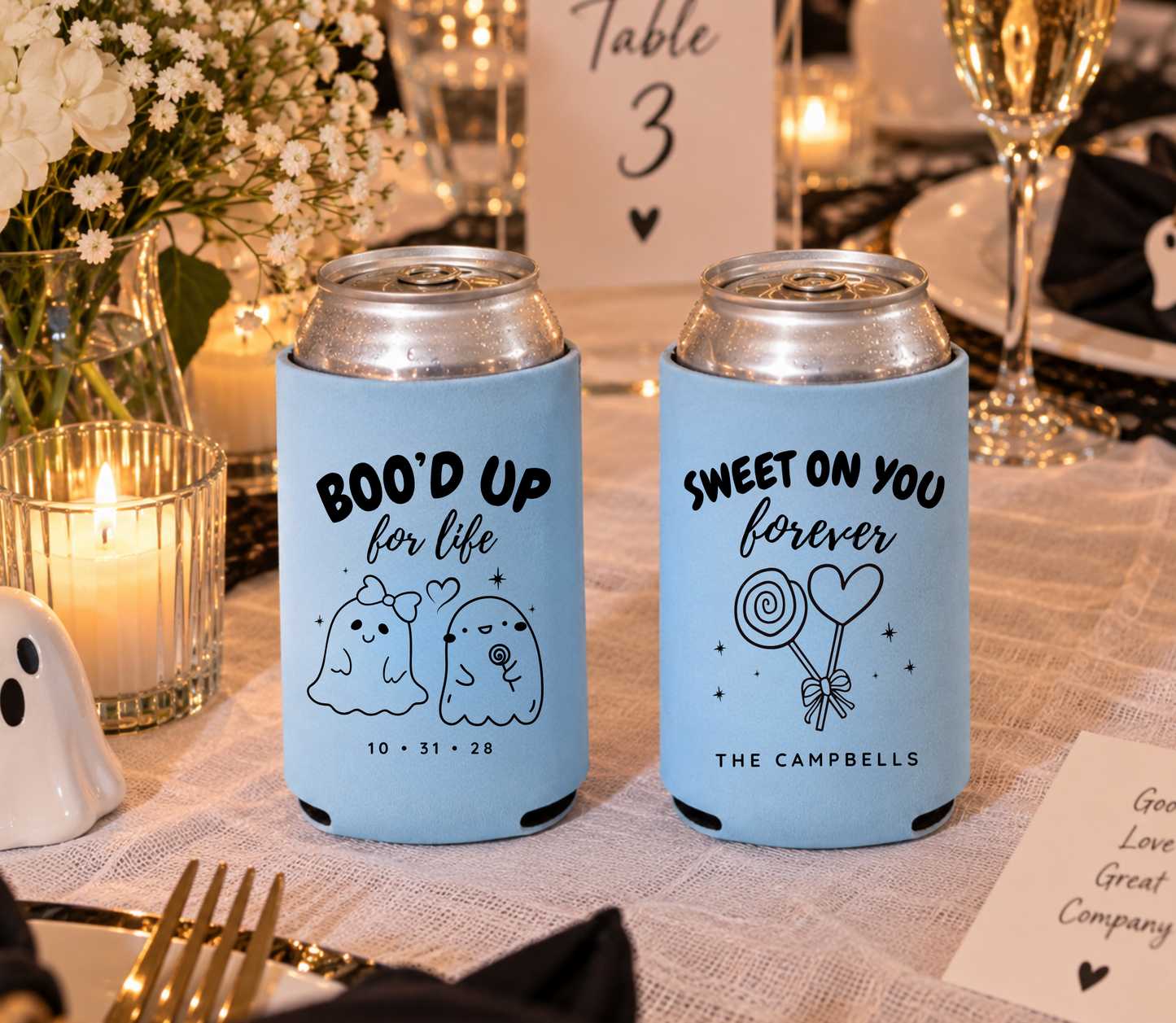 Light blue Halloween wedding can coolers with cute ghost couple artwork.