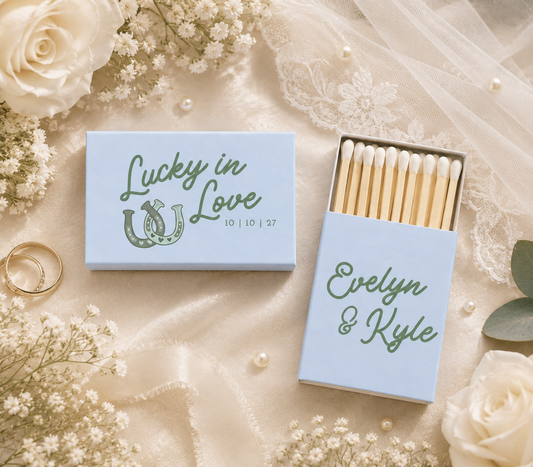 Personalized horseshoe wedding matchbox featuring custom names and wedding date.