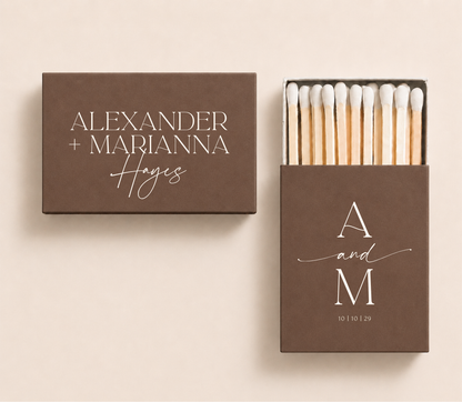 Personalized minimalist wedding matchboxes featuring custom initials, couple's names, family name, and wedding date in an elegant monogram design.
