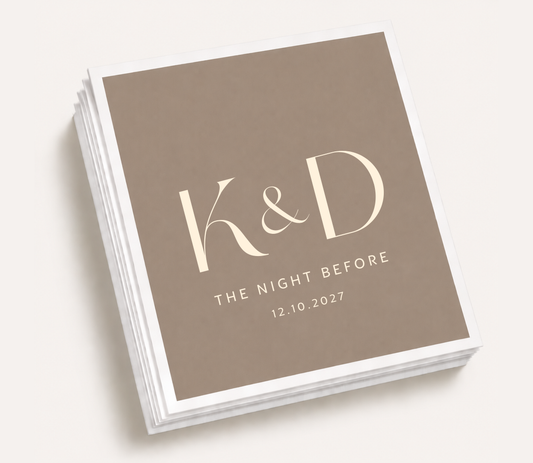Personalized monogram wedding cocktail napkins featuring custom couple initials with The Night Before wording and wedding date for rehearsal dinners and welcome parties.