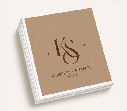 Personalized monogram wedding cocktail napkins featuring custom initials, couple names, and wedding date in an elegant minimalist design.
