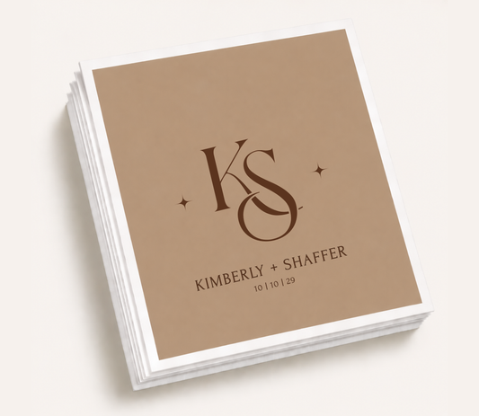 Personalized monogram wedding cocktail napkins featuring custom initials, couple names, and wedding date in an elegant minimalist design.