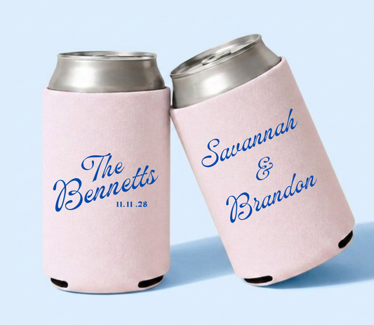 Personalized blush pink wedding can coolers featuring Savannah and Brandon with The Bennetts family name and wedding date in vibrant blue script.