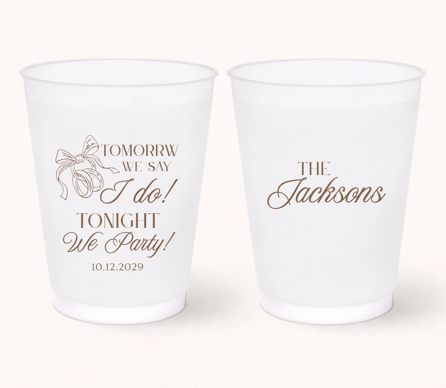 Personalized rehearsal dinner frosted cups featuring the phrase "Tomorrow We Say I Do, Tonight We Party!" with a custom family name and wedding date for wedding weekend celebrations.