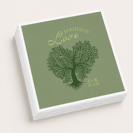 Sage green personalized Rooted in Love wedding cocktail napkins featuring a heart-shaped tree, custom initials S and K, and wedding date.