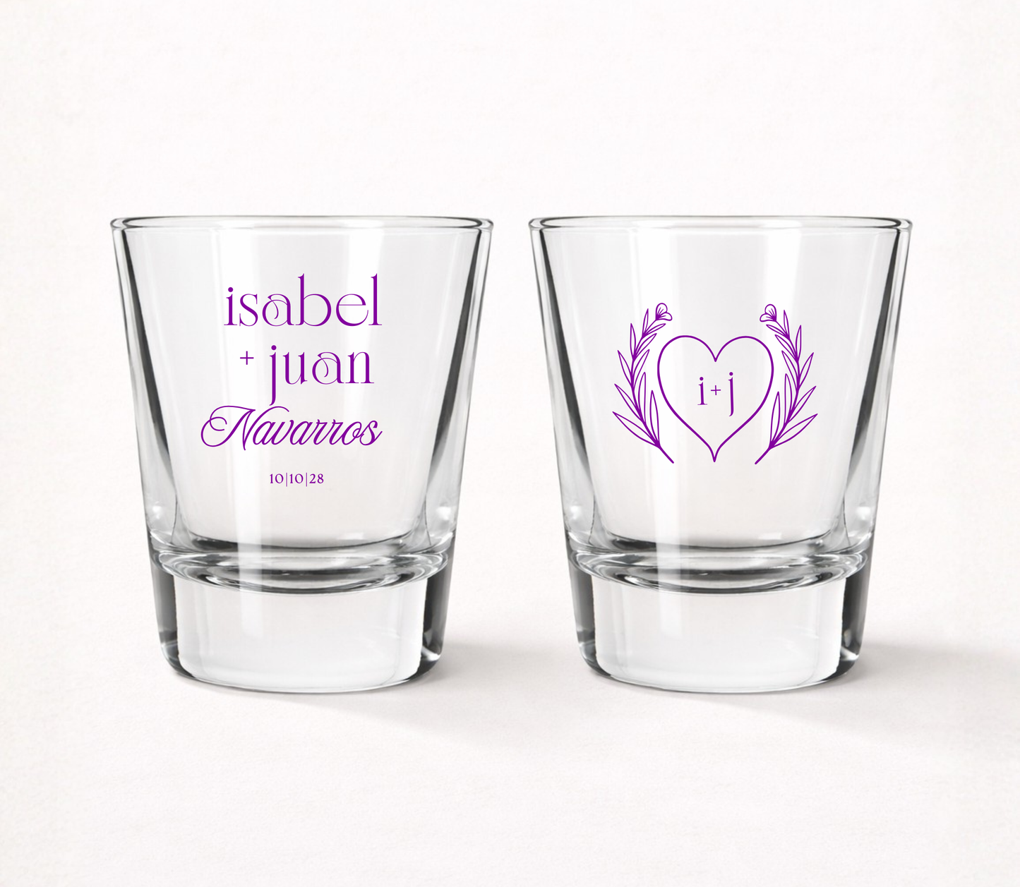 Personalized Heart Monogram wedding shot glasses featuring custom couple names, family name, initials, wedding date, and elegant botanical heart design.