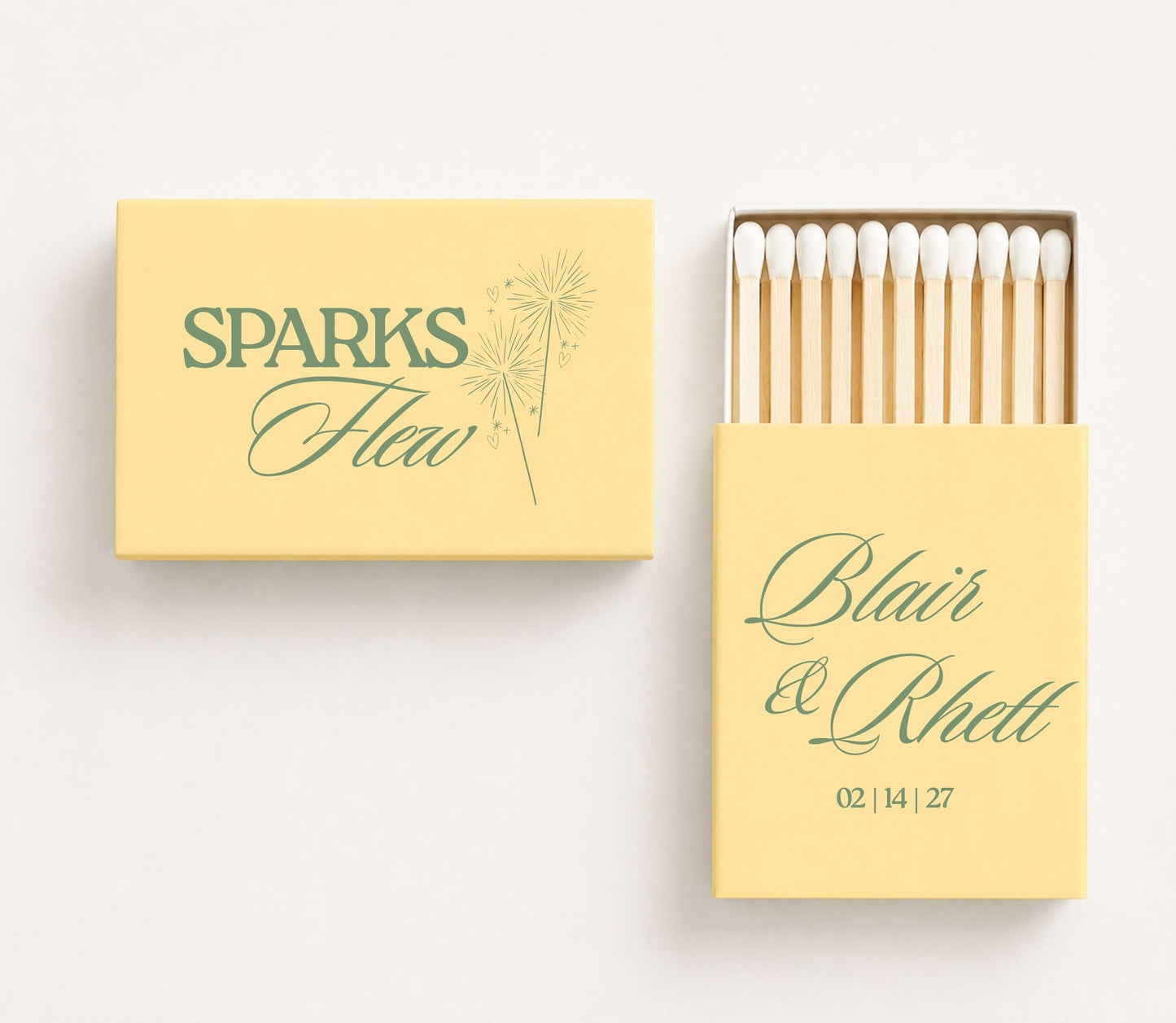 Personalized wedding matchboxes featuring Sparks Flew sparkler artwork with custom names Blair and Rhett and wedding date.