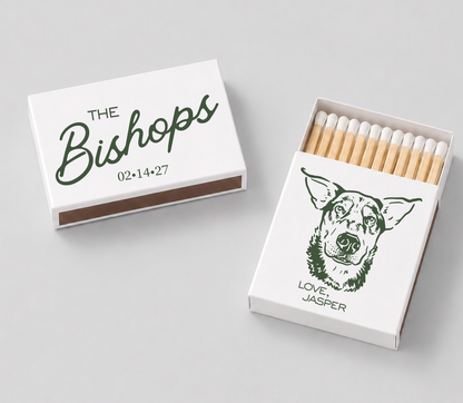 Personalized pet portrait wedding matchboxes with green custom dog artwork, couple name, wedding date, and pet name on white matchboxes