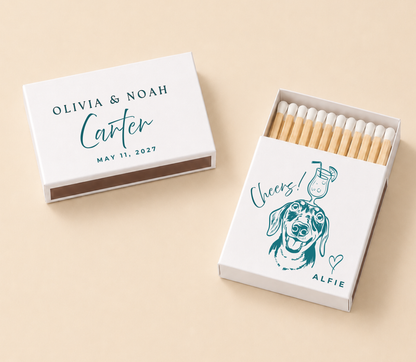 Personalized pet portrait wedding matchboxes with teal custom dog artwork, couple names, wedding date, and pet name on white matchboxes