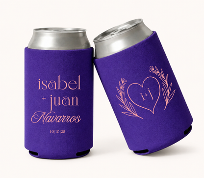 Personalized purple wedding can coolers featuring Isabel and Juan Navarros with wedding date and a heart outline initial design surrounded by botanical line art in soft peach printing.
