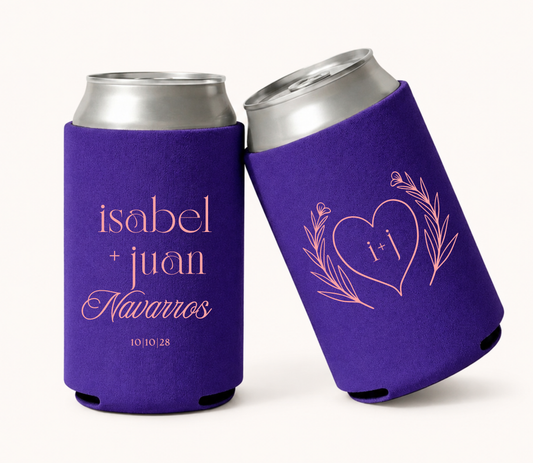 Personalized purple wedding can coolers featuring Isabel and Juan Navarros with wedding date and a heart outline initial design surrounded by botanical line art in soft peach printing.