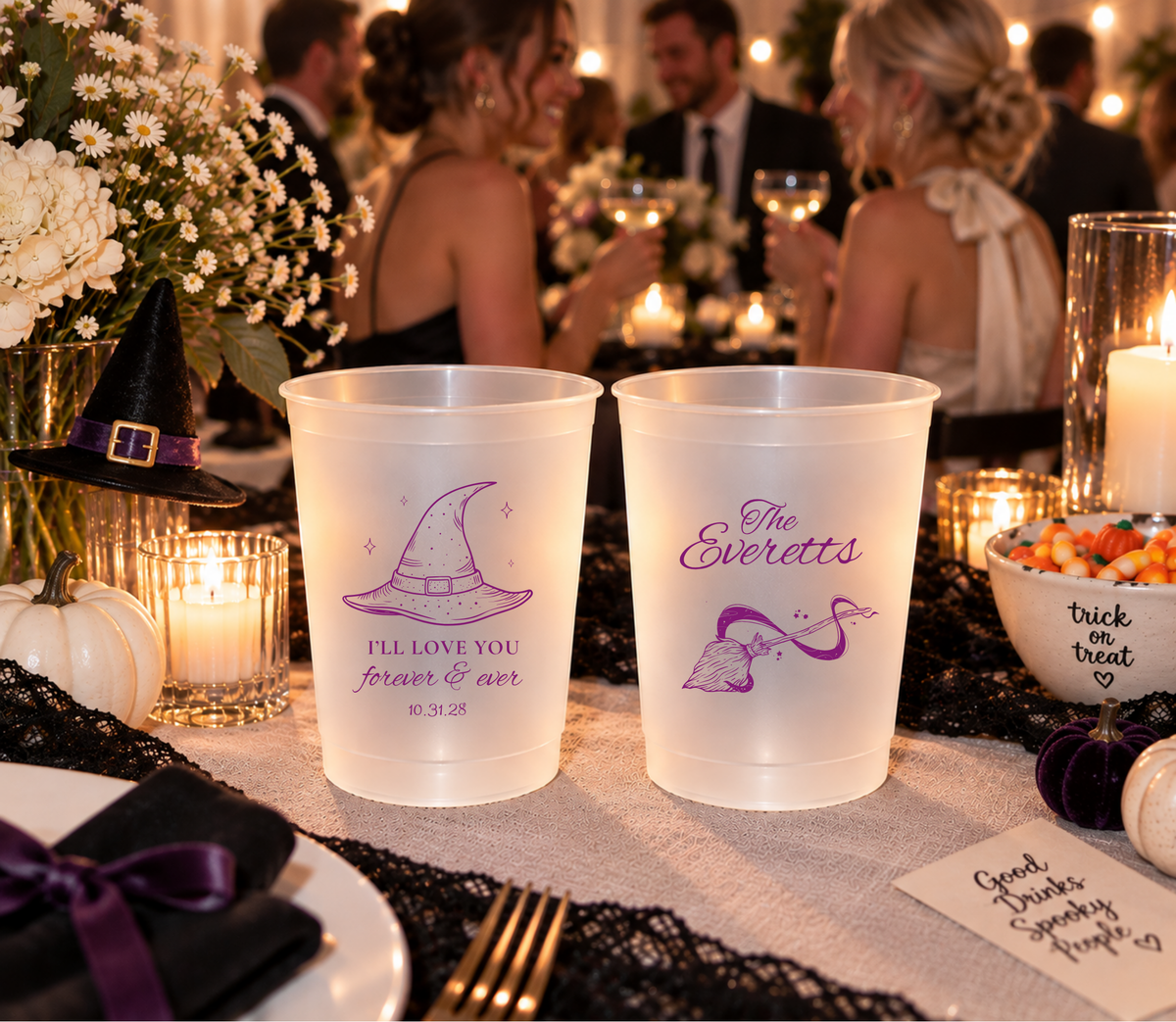 Personalized Halloween wedding cups with custom family name and date.