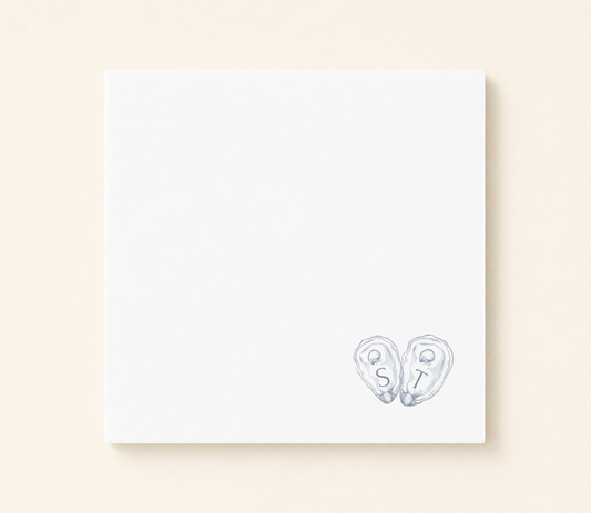 Minimalist oyster shell wedding napkin featuring custom initials inside hand illustrated oyster shells