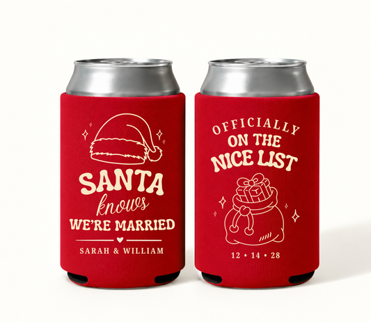 Personalized red Santa Knows We’re Married Christmas wedding can coolers featuring cream Santa hat and gift sack artwork, Sarah and William names, and wedding date 12.14.28.