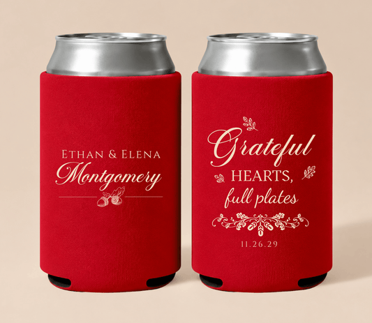 Personalized red Thanksgiving wedding can coolers featuring “Grateful Hearts, Full Plates” wording, custom couple names, wedding date, and botanical accents.