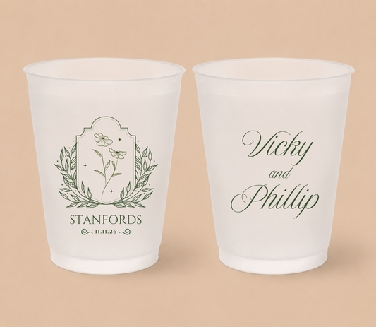 White frosted wedding cups featuring elegant wildflower botanical artwork, custom family surname Stanfords, couple names Vicky and Philip, and wedding date.
