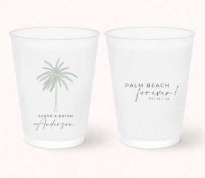 Two personalized frosted wedding cups featuring a minimalist palm tree illustration with Sarah & Bryan Anderson on one side and the phrase "Palm Beach Forever!" with the wedding date 05.10.28 on the reverse.
Personalized Palm Beach wedding cup featuring a minimalist palm tree illustration and custom names.
Reusable frosted wedding cup with tropical palm artwork and personalized destination wedding details.