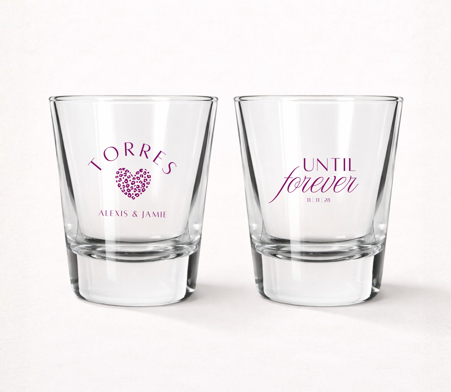 Personalized Until Forever wedding shot glasses featuring custom family name, couple names, wedding date, and modern heart design.