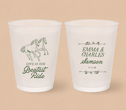 White frosted wedding cups featuring running horses with personalized couple names, family surname, and wedding date for a Western wedding.