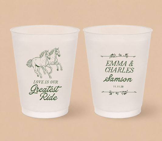White frosted wedding cups featuring running horses with personalized couple names, family surname, and wedding date for a Western wedding.