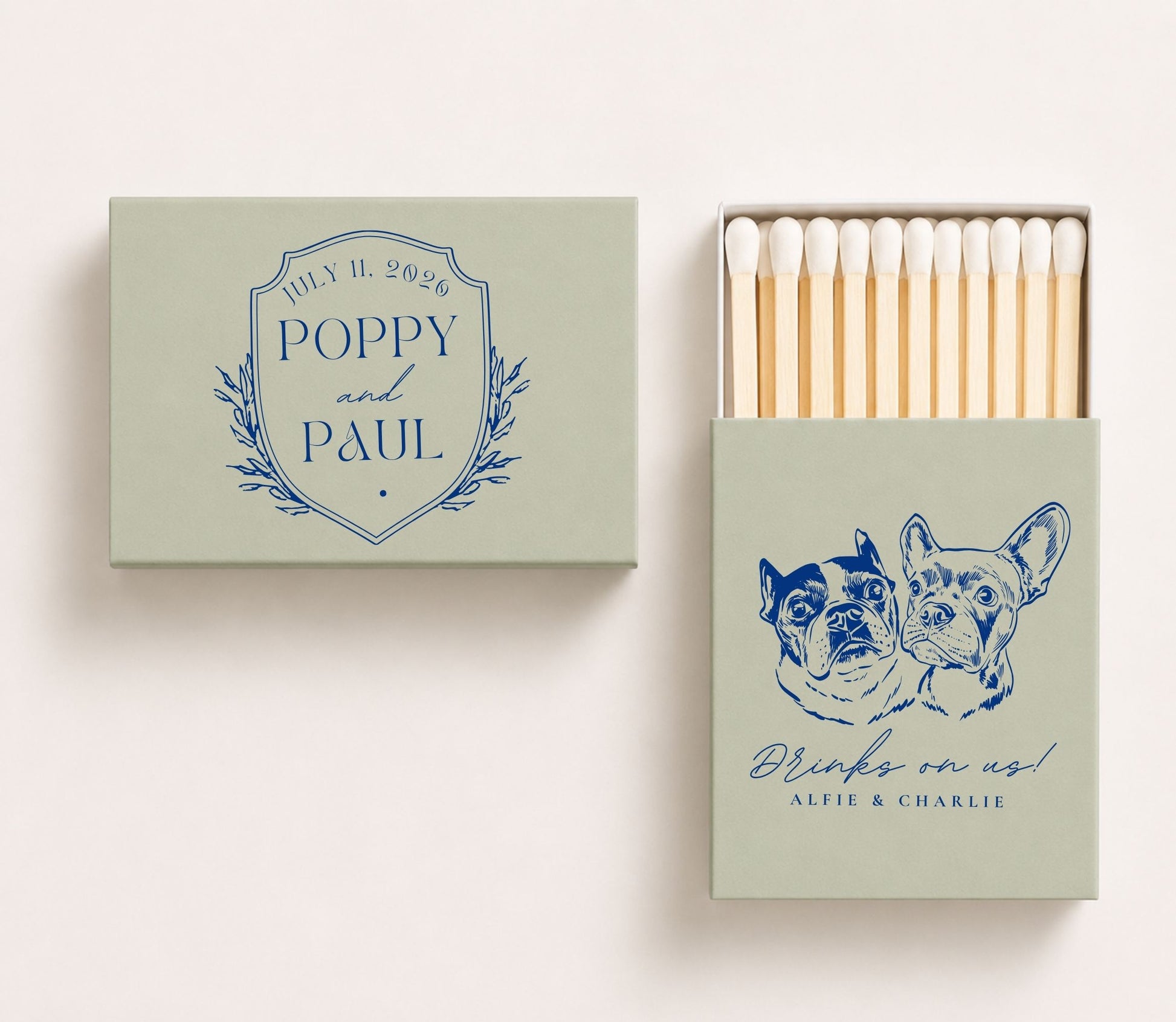 Sage green personalized wedding matchbox featuring custom French Bulldog portraits, Poppy and Paul wedding crest design, wedding date, and "Drinks on us" pet wedding favor artwork.
Personalized wedding matchbox featuring custom French Bulldog artwork and elegant wedding details.