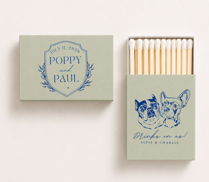 Sage green personalized wedding matchbox featuring custom French Bulldog portraits, Poppy and Paul wedding crest design, wedding date, and "Drinks on us" pet wedding favor artwork.
Personalized wedding matchbox featuring custom French Bulldog artwork and elegant wedding details.