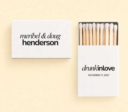Modern personalized wedding matchbox featuring minimalist typography and custom names.
Custom white wedding matchbox with bold typography and wedding date personalization.