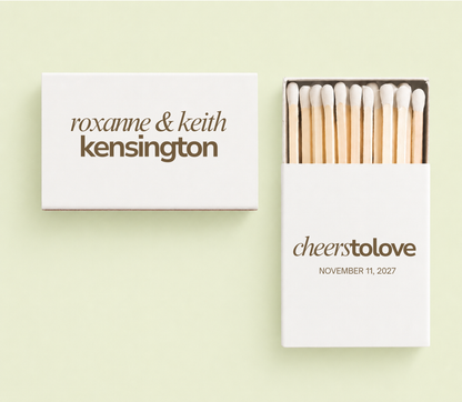 Minimalist personalized wedding matchbox with modern typography and custom wedding details.
Custom white wedding matchbox featuring elegant typography and personalized couple names.