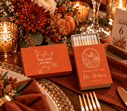 Personalized fall wedding matchboxes featuring pumpkins, autumn foliage, and a “Thankful Together” message.