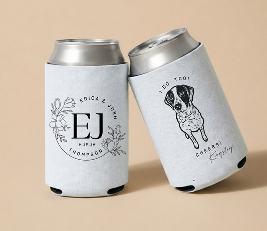 White personalized wedding can coolers featuring a custom dog portrait illustration and floral wedding monogram with names and wedding date.