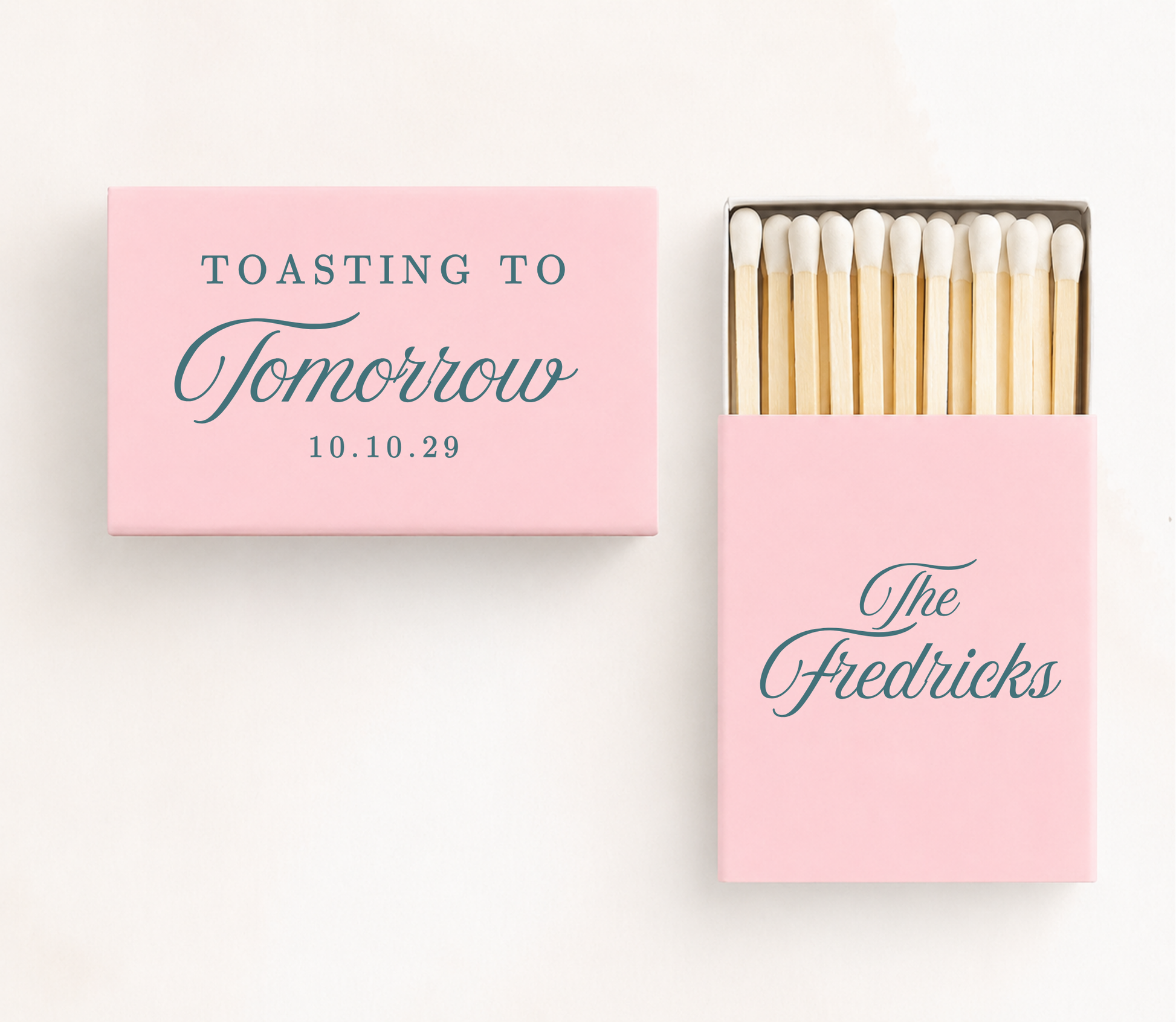 Personalized "Toasting To Tomorrow" wedding matchboxes featuring custom family name and wedding date for rehearsal dinners and wedding weekend celebrations.
