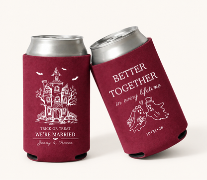 Personalized Trick or Treat We’re Married burgundy Halloween wedding can coolers featuring haunted house artwork, custom couple names, wedding date, and bride and groom ghost design.