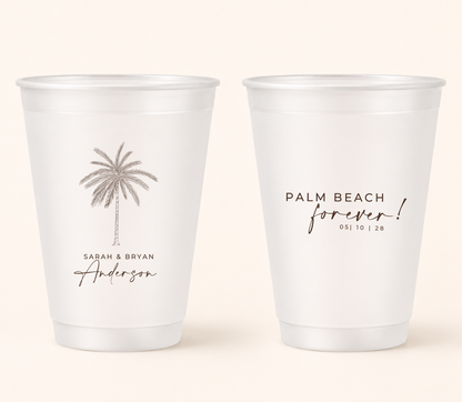 Personalized palm beach frosted wedding cups with brown palm tree artwork, custom names, and wedding date for tropical wedding favors