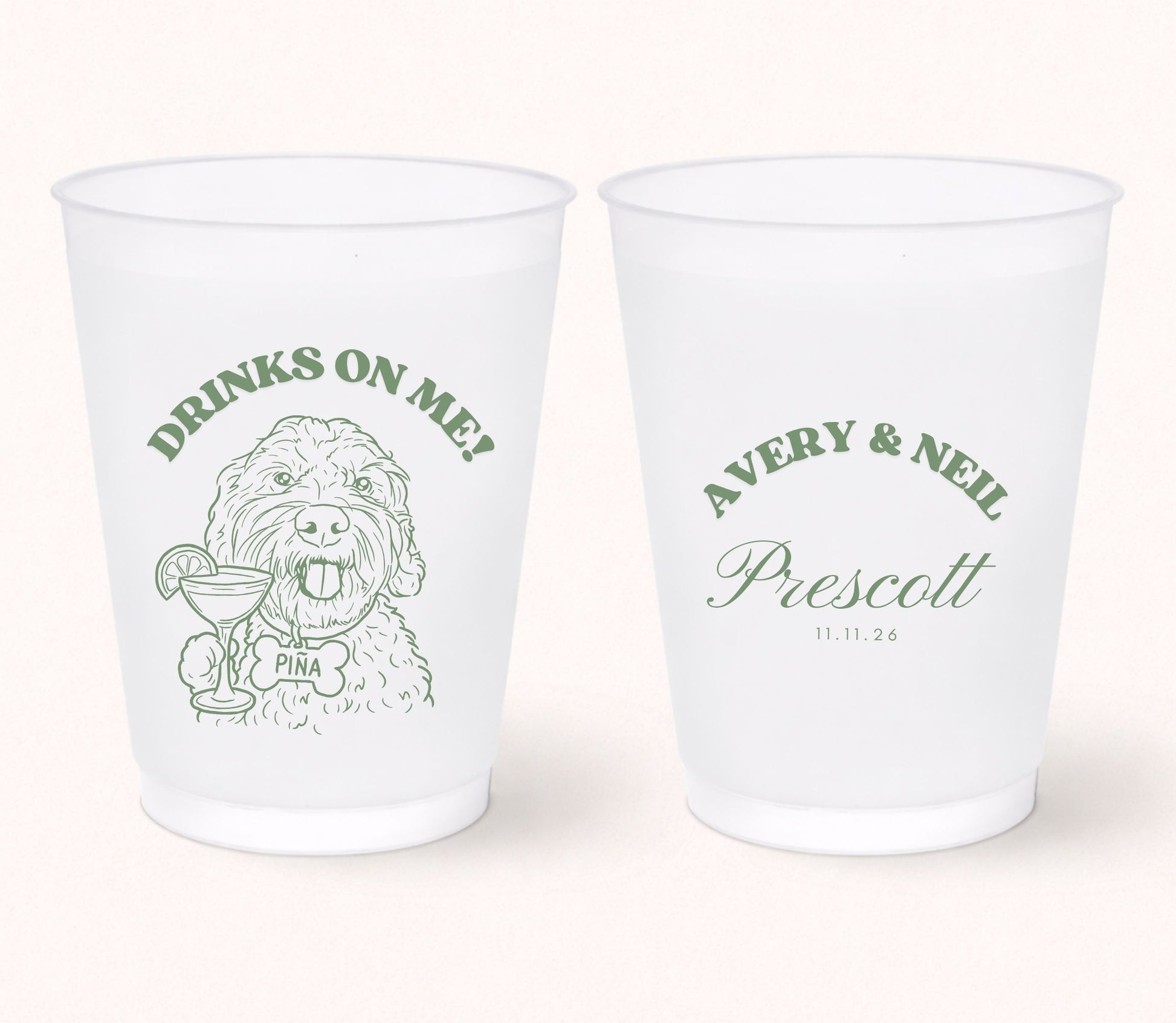 Two personalized frosted wedding cups featuring a custom dog portrait holding a cocktail with the pet name Pina on the front and Avery & Neil Prescott with the wedding date 11.11.26 on the back in sage green print.
Personalized frosted wedding cup featuring a custom dog portrait with a signature cocktail illustration.
Custom pet portrait wedding cup with dog artwork, personalized names, and wedding date.