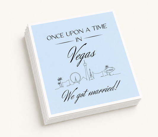 Personalized Las Vegas wedding cocktail napkins featuring a Vegas skyline illustration and custom wedding wording.