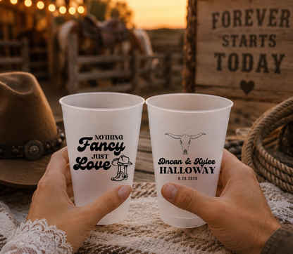 Personalized western wedding frosted cups featuring cowboy boots artwork, longhorn skull illustration, custom names, and wedding date