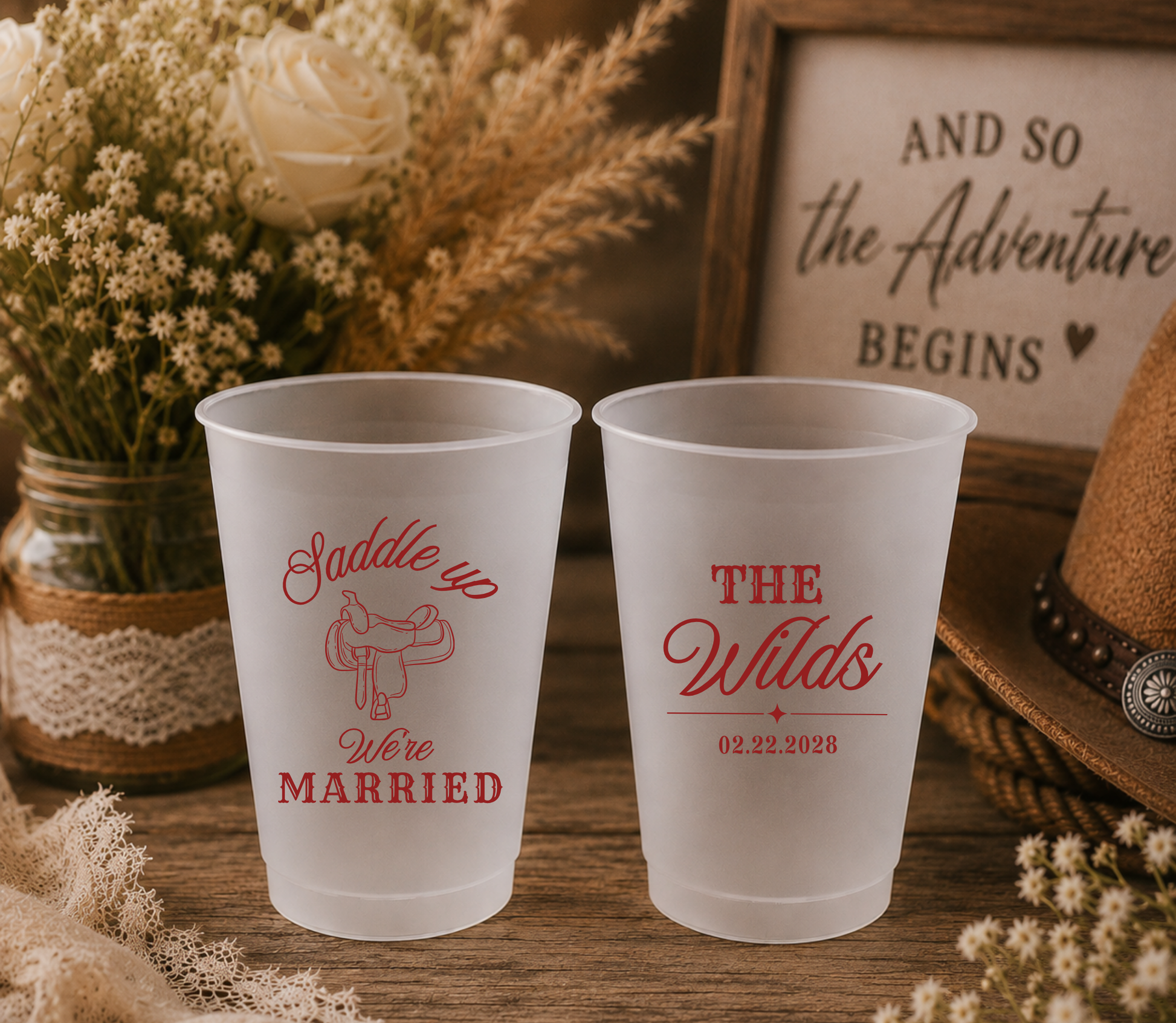 Personalized western wedding frosted cups featuring saddle artwork, custom family name, and wedding date