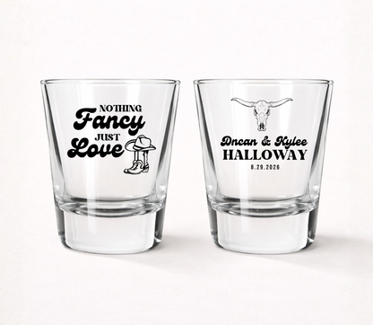 Western wedding shot glasses with cowboy design
Nothing Fancy Just Love wedding shot glass
Country wedding favor shot glass
Rustic wedding shot glasses with longhorn skull
Personalized western wedding barware
Custom ranch wedding shot glasses
