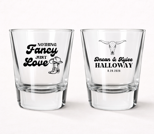 Western wedding shot glasses with cowboy design
Nothing Fancy Just Love wedding shot glass
Country wedding favor shot glass
Rustic wedding shot glasses with longhorn skull
Personalized western wedding barware
Custom ranch wedding shot glasses