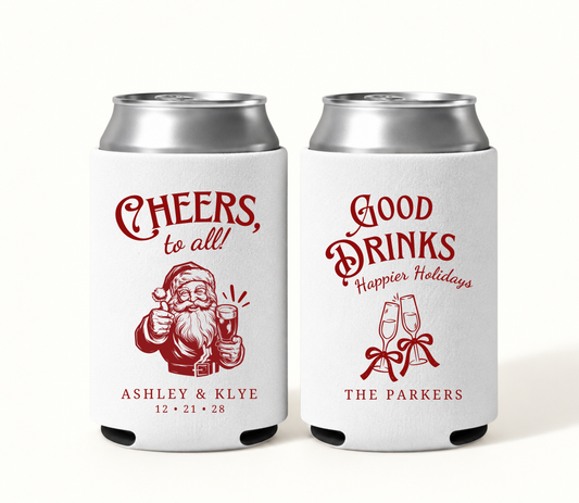 Personalized white Cheers To All Christmas wedding can coolers featuring red vintage Santa artwork, Ashley and Klye names, wedding date 12.21.28, champagne glasses, and The Parkers surname.